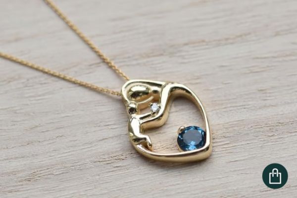 Anhaenger mit London Topas und Diamant