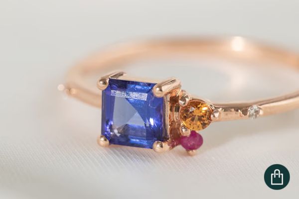 Cluster-Ring Kenny mit orangem Saphir, Tansanit, Rubin und Diamant