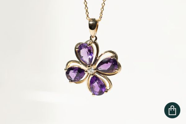 Goldanhänger mit Diamant und Amethyst-Kleeblatt