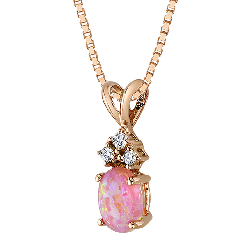 Goldener Anhänger mit rosa Opal und Diamanten Cort
