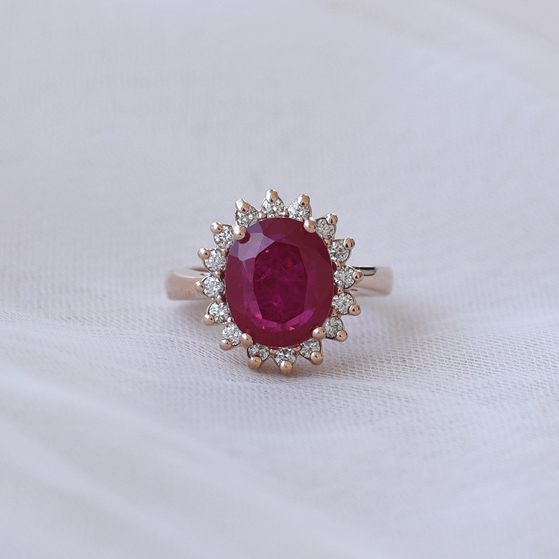 Goldener Halo-Ring mit Rubin und Diamanten Klement 68961