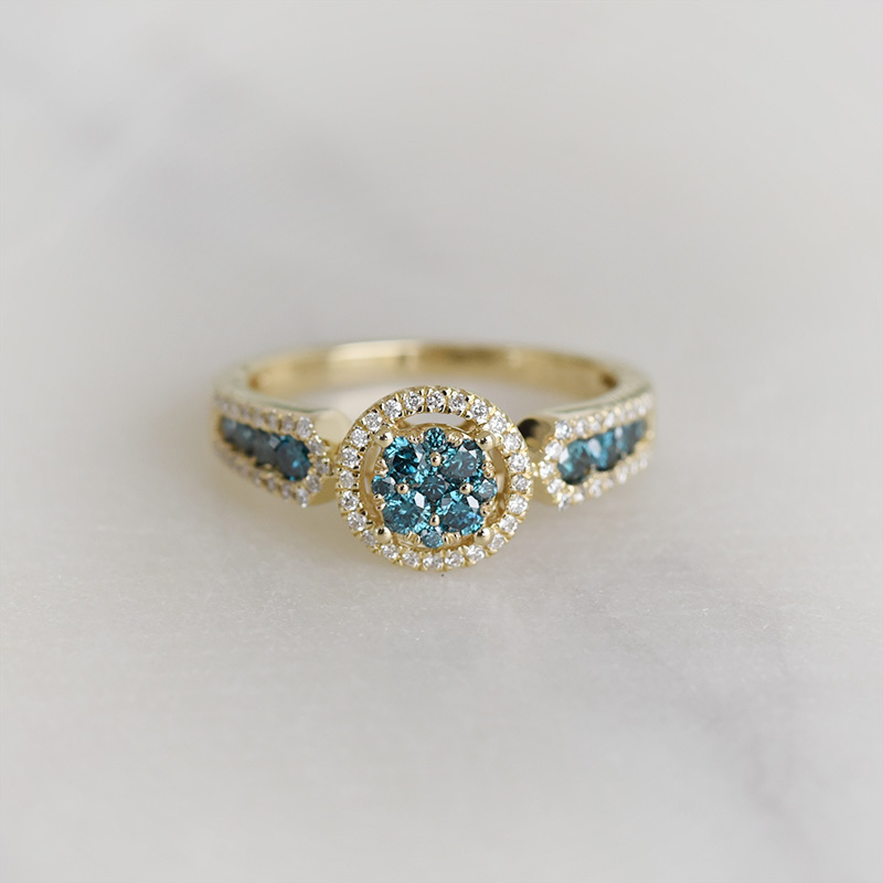 Goldener Diamantring mit blauen Diamanten Sirena 93651