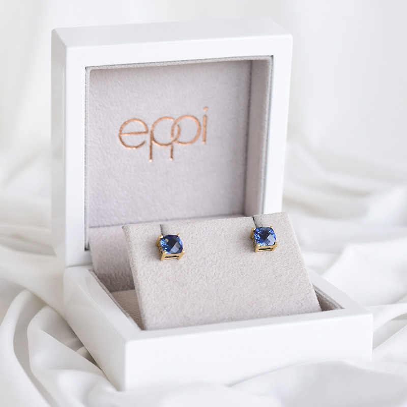 Goldene Ohrringe mit blauen Saphiren Raule