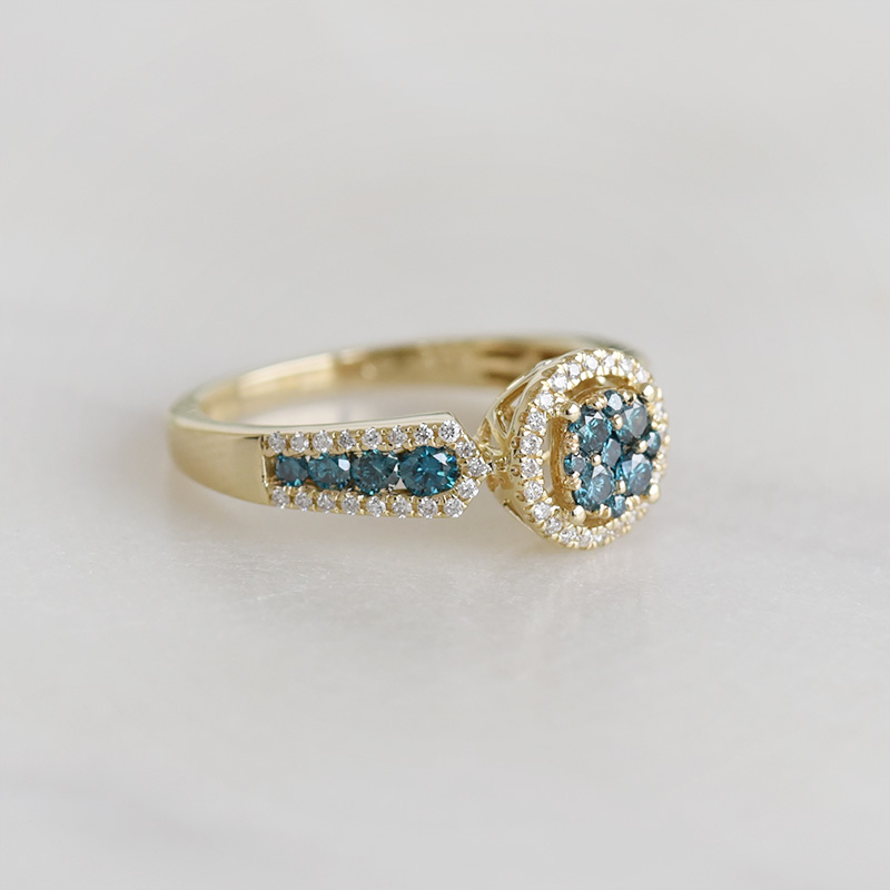 Goldener Diamantring mit blauen Diamanten Sirena 93652