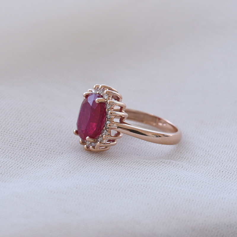 Goldener Halo-Ring mit Rubin und Diamanten Klement 68963