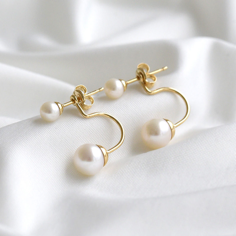 Goldene Perlenohrringe im minimalistischen Stil Norah 80914