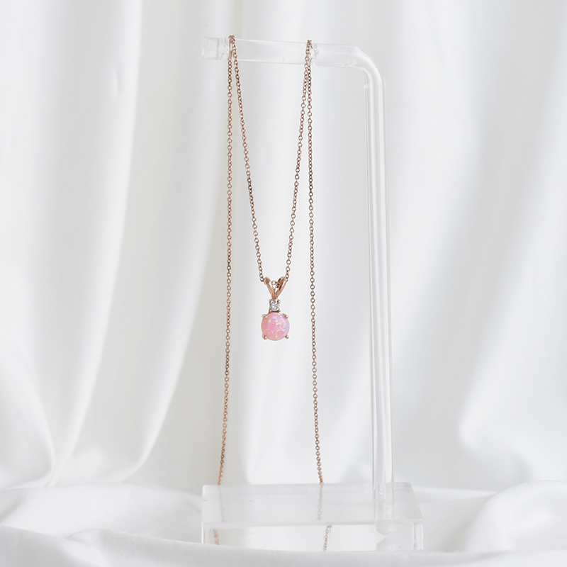 Goldener Anhänger mit rosa Opal und Diamant Mirela 93694