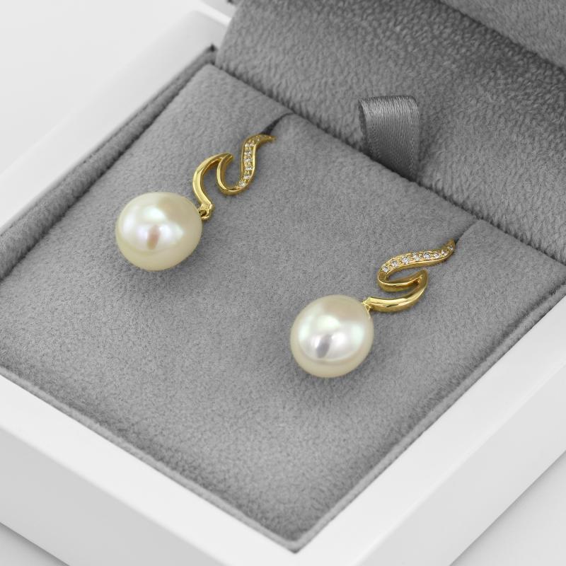 Luxuriöse Ohrringe mit Perlen 10845