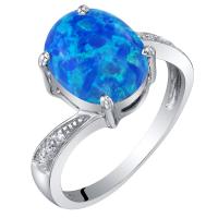 Goldener Ring mit blauem Opal und Diamanten Saqib