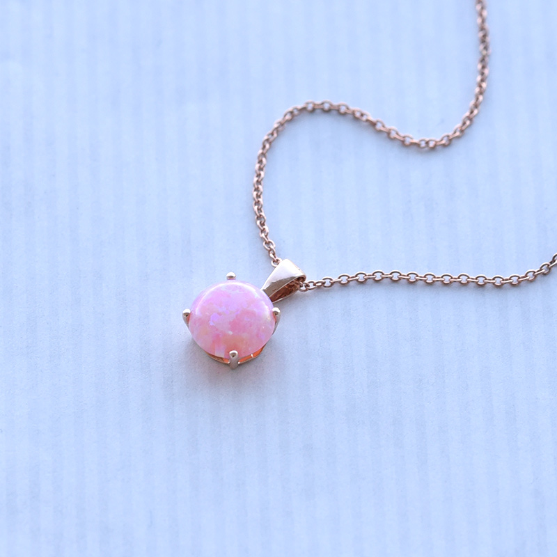 Goldener Anhänger mit Opalen in rosa Romeo 72615