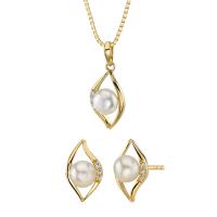 Goldene Schmuckkollektion mit weißen Perlen und Zirkonia Medea