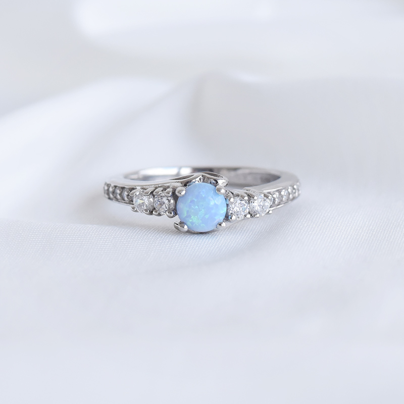 Silberner Ring mit blauem Opal und Zirkonia Tereza 93499